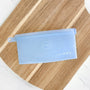 snack zipbag on a wooden cutting board, silicone reusable and sustainable bag