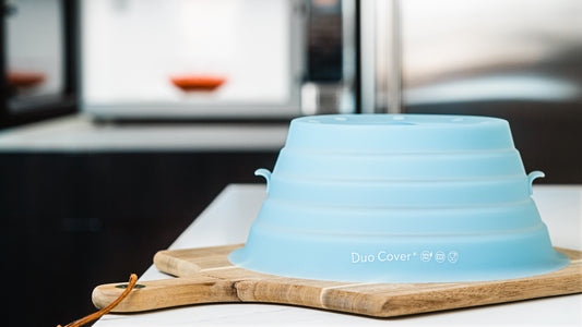 Duo Cover, silicone eco-friendly microwave cover sitting on top of a kitchen counter