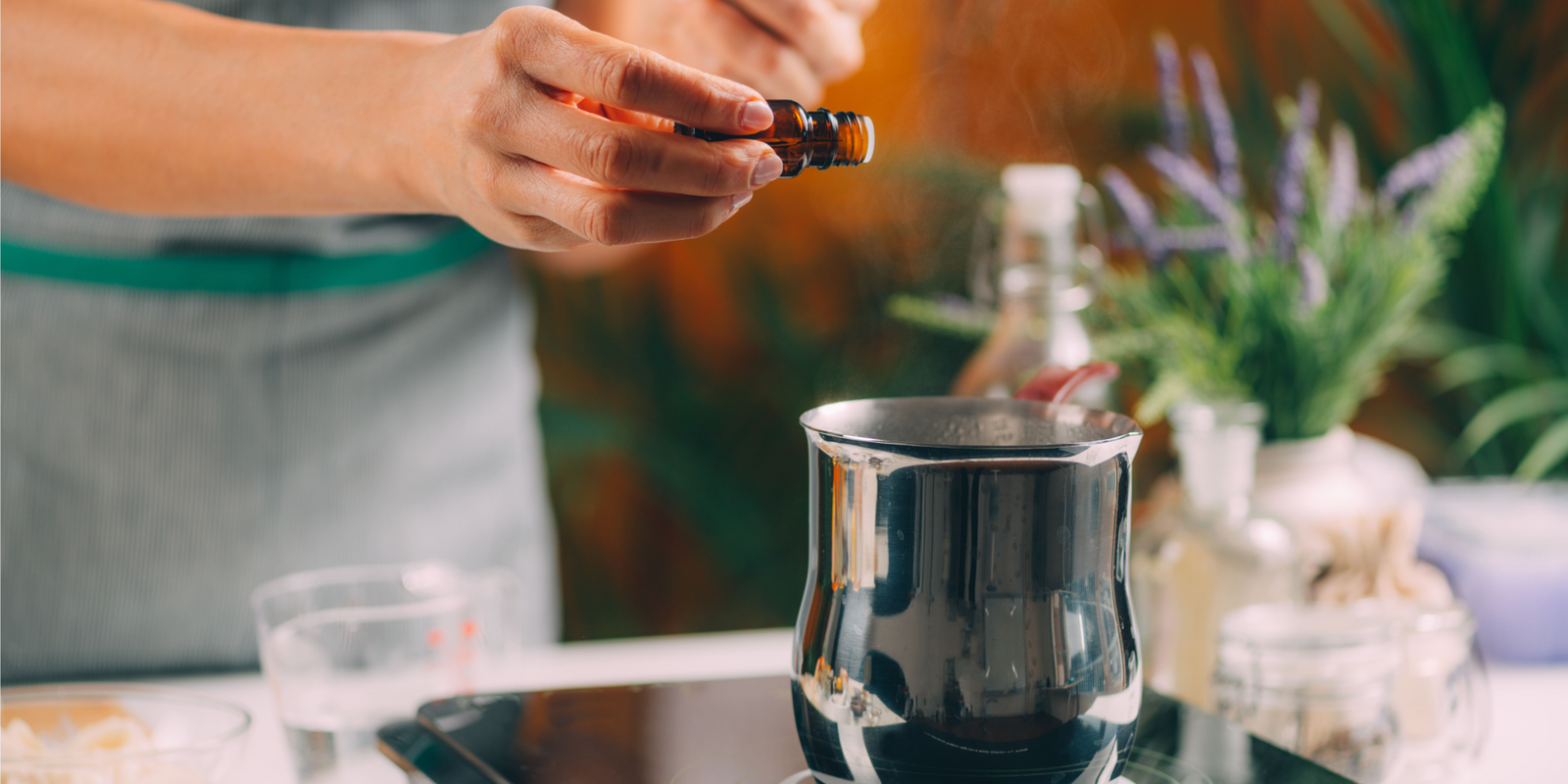 Woman Preparing Homemade Soap with Essential Oil Extracts