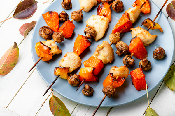  BBQ with chicken, pumpkin,pepper and mushrooms on a plate