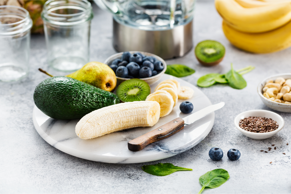 Chopped fruit for breakfast smoothie. Bananas, Avocado, kiwi, pears.