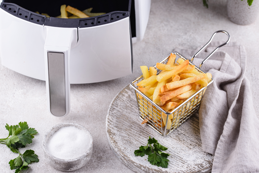 French fries cooked in an air fryer. Healthier food options. Low fat diet.