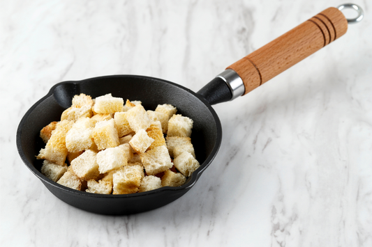  Crispy Homemade Croutons for Soup Side Dish, Served on Cast Iron Pan, Copy Space