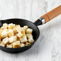  Crispy Homemade Croutons for Soup Side Dish, Served on Cast Iron Pan, Copy Space