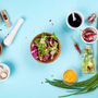 Cooking - dark brown salad dressing and recipe ingredients balsamic vinegar, honey, olive oil, mustard, garlic, salt . Layout captured from above top view, flat lay .