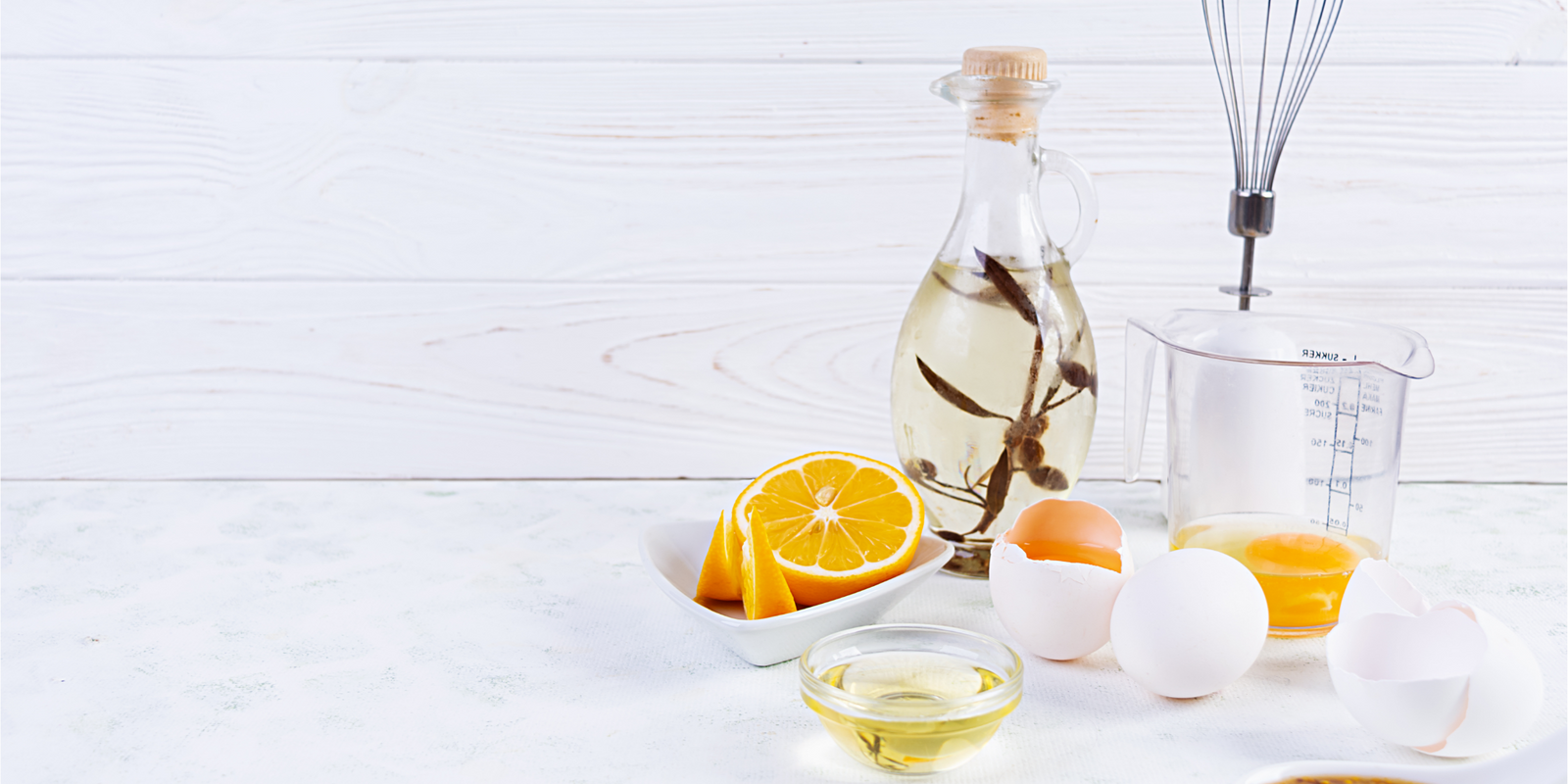 Ingredients for mayonnaise. Delicious homemade mayonnaise with ingredients for the sauce. Homemade dressing for salads.