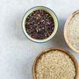 bowls of uncooked rice in a white countertop, minimalist