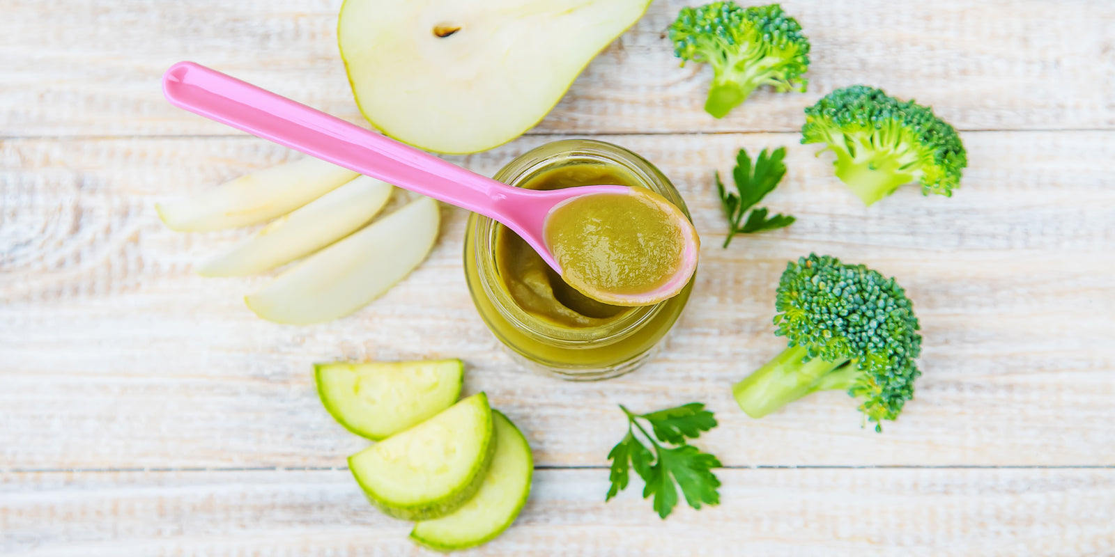 Homemade baby food in small jars. Selective focus