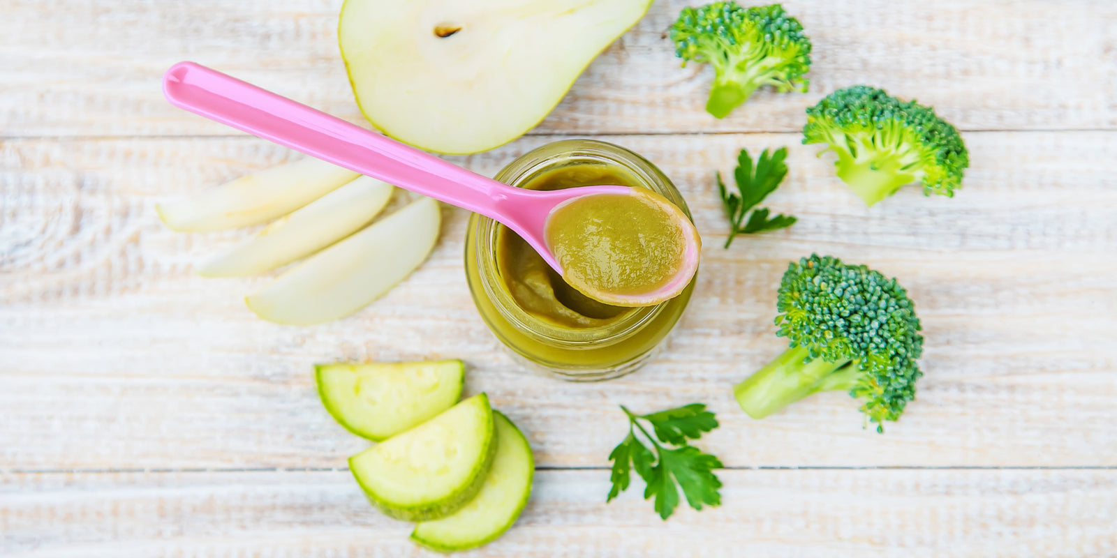 Homemade baby food in small jars. Selective focus