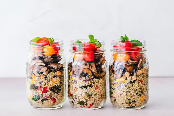 Healthy breakfast meal prep, mason jars with oats and fruits